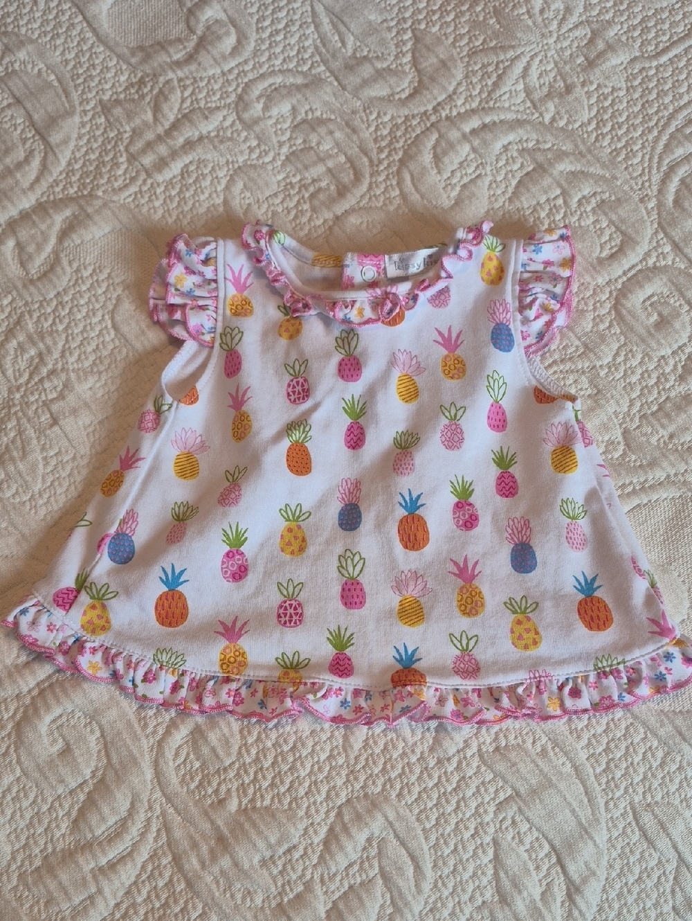 Kissy Kissy girls size 0-3 months pineapple designed top EUC